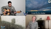 "Till The Clouds Roll By" - voice and guitar