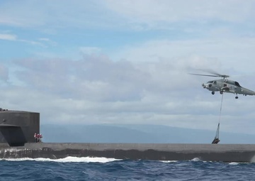 MH-60R Sea Hawk Delivers Payload to USS Henry M. Jackson