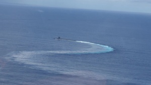 C-17 Globemaster III Airdrops Payload To USS Henry M. Jackson
