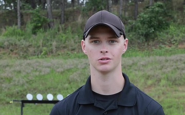 U.S. Army Marksmanship Unit Action Shooting team member Pvt. 1st Class Houston Russell gives a Veterans Day greeting.