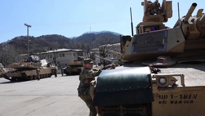 1st Battalion, 18th Infantry Regiment Soldier Conducting Tank Maintenance