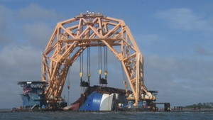 Anchor chain attached to the pulley system on the VB-10000 heavy-lift vessel moves slowly to cut through Section One of the Golden Ray wreck.