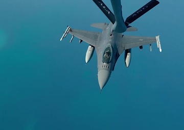 KC-135R Stratotanker refuels F-16C Fighting Falcon and F-15E Strike Eagle