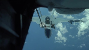 KC-10 Stratotanker refuels F/A 18 Hornet