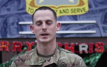 Sgt. 1st Class Michael Raines, Middletown, MD, delivers a Christmas message