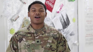 Spc. Trent Tardy from Copperas Cove, TX, delivers a Christmas message