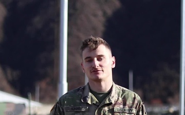 Spc. Carter Nagel, Lincoln, NE, delivers a Christmas message