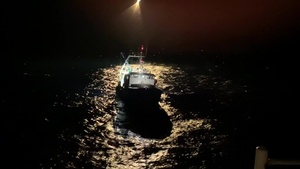 Coast Guard lights flare above F/V Fearless off coast of Nantucket