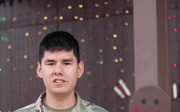 Spc. Keegan Staab, Hubbard, NE, delivers a Christmas message