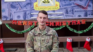 Cpl. Cade Lewis, Baxter, IA, delivers a Christmas message