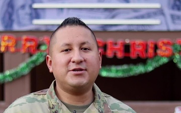 Capt. Dennis Naranjo, Eldridge, IA, delivers a Christmas message