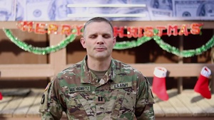 Capt. Samuel Mathiowetz, Guttenberg, IA, delivers a Christmas message