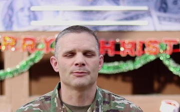 Capt. Samuel Mathiowetz, Guttenberg, IA, delivers a Christmas message