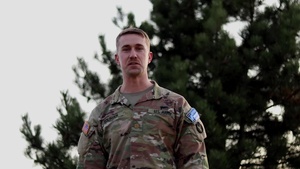 Maj. Mike Solinger, Des Moines, IA, delivers a Christmas message