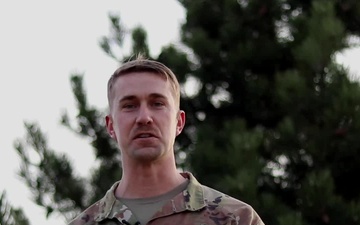 Maj. Mike Solinger, Des Moines, IA, delivers a Christmas message