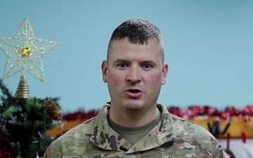 Maj. Scott Rottinghaus, Waterloo, IA, delivers a Christmas message