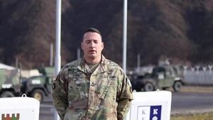 Sgt. 1st Class Jason Stoos, Ankeny, IA, delivers a Christmas message