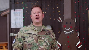 Sgt. Derrick Colyer, Sioux City, IA, delivers a Christmas message