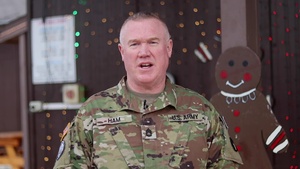 Sgt. 1st Class Jeffery Ham, Sioux City, IA, delivers a Christmas message