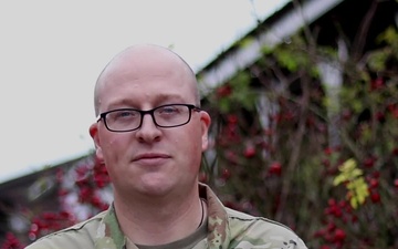 Sgt. 1st Class David Laubscher, Ankeny, IA, delivers a Christmas message