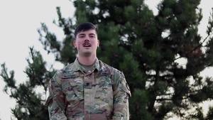 Spc. Brady Butters, Moville, IA, delivers a Christmas message