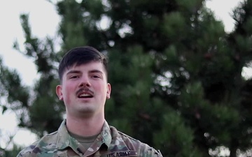 Spc. Brady Butters, Moville, IA, delivers a Christmas message