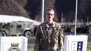 Spc. Brennan Callahan, Independence, IA, delivers a Christmas message