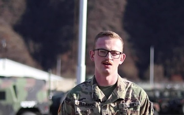 Spc. Brennan Callahan, Independence, IA, delivers a Christmas message