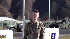 Spc. Shay Galles, Remsen, IA, delivers a Christmas message