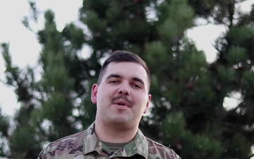 Spc. Sean Lara, Sioux City, IA, delivers a Christmas message