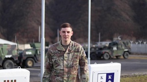 Spc. Tristen Vanderheiden, Pella, IA, delivers a Christmas message