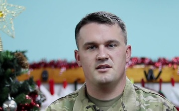 Staff Sgt. Jeremy Murphy, Cedar Rapids, IA, delivers a Christmas message