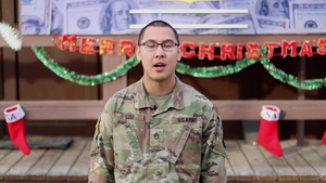 Staff Sgt. Jimmy Luu. Waukee, IA, delivers a Christmas message