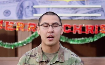 Staff Sgt. Jimmy Luu. Waukee, IA, delivers a Christmas message