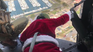 B-Roll: Happy Holidays: Santa, Marines fly over Pendleton, North County neighborhoods