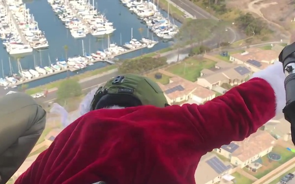 B-Roll: Happy Holidays: Santa, Marines fly over Pendleton, North County neighborhoods
