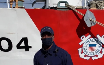 A U.S. Coast Guard member from Coast Guard Cutter Northland sends a holiday message for the 2020 Armed Forces Bowl