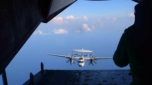 VRC-30 and VAW-116 Conducts Flying Drills