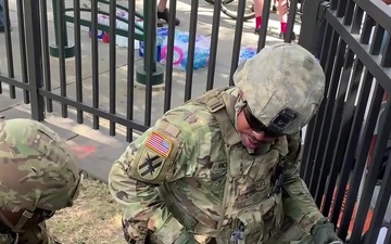 Georgia National Guard medics treat overheated protester