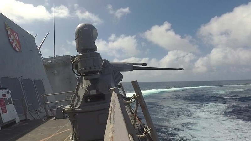 USS Sterett fires Mark 38 25mm machine gun