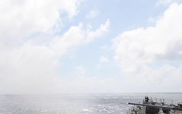 USS Sterett (DDG 104) fires Mark 45 5-inch gun during live fire exercise