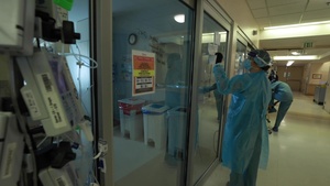 U.S. Air Force Capt. Ashley Mills works alongside Arrowhead Regional Medical Center Personnel in California