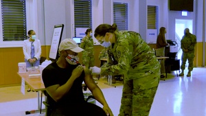 Registered Nurse, Air Force Capt. Kedrian Guy gets the Moderna COVID-19 Vaccine
