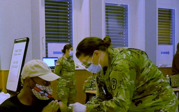 Registered Nurse, Air Force Capt. Kedrian Guy gets the Moderna COVID-19 Vaccine