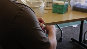 B-ROLL: DoD medical providers fitted for N95 masks during COVID-19 relief operations