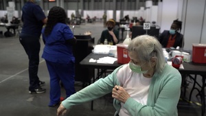 National Guard helps first Priority 1b NY resident receive COVID-19 vaccine