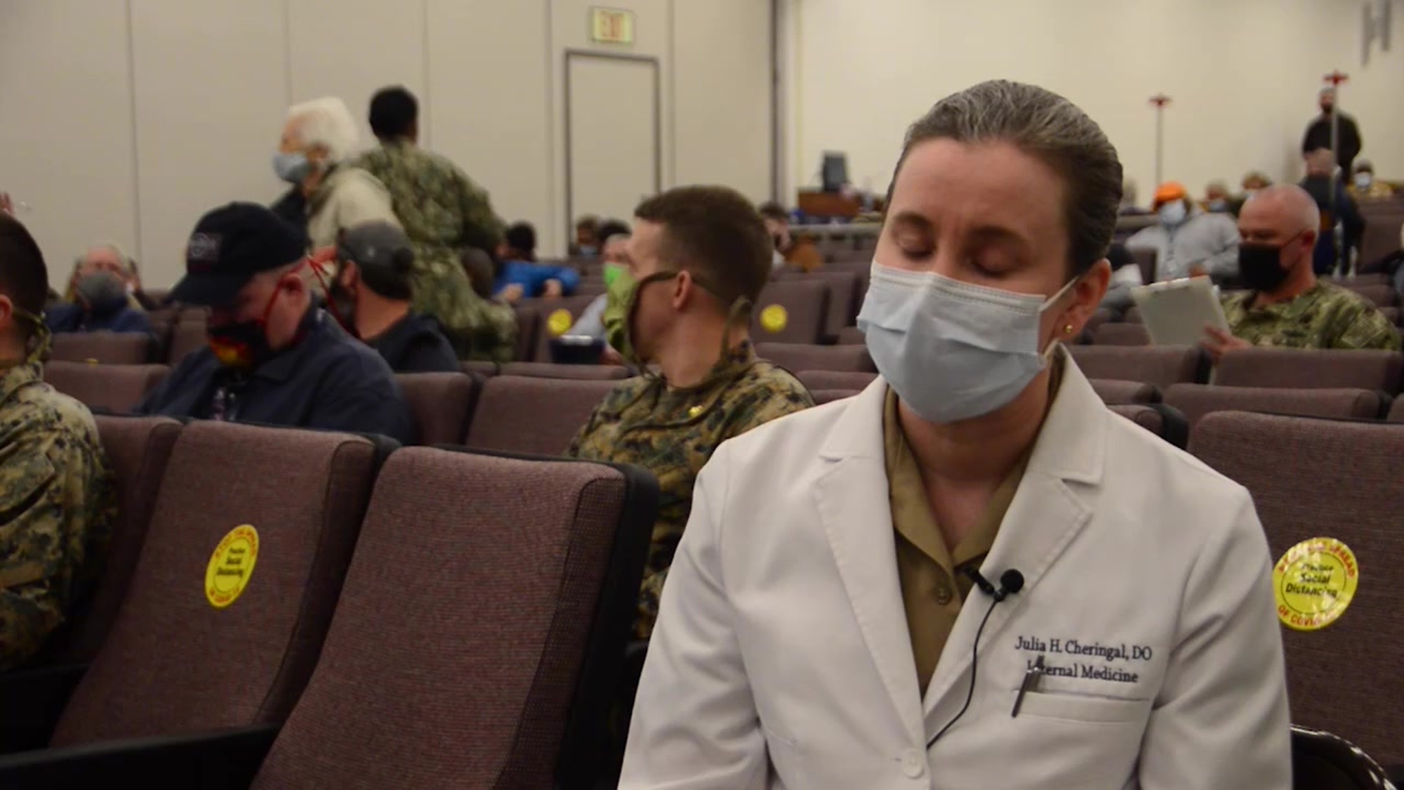 PORTSMOUTH, Va. (Jan. 14, 2021) – Capt. Jonathan Kline, commanding officer of Naval Support Activity Hampton Roads, interviews Lt. Cmdr. Julia Cheringal, Naval Medical Center Portsmouth’s public health emergency officer, in the NMCP auditorium, Jan. 14. (U.S. Navy video by Mass Communication Specialist 2nd Class Dylan M. Kinee/Released)