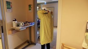 Yuma Regional Medical Center Respiratory Therapist donning PPE