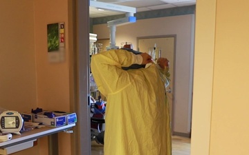 Yuma Regional Medical Center Respiratory Therapist donning PPE