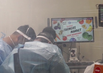 U.S. Air Force medic assists medical providers at Harbor-UCLA Medical Center